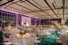 Elegant Indian wedding reception table setup. Elegant Indian wedding reception table setup.
