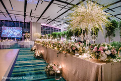 Unique Indian wedding reception table flowers decoration. Unique Indian wedding reception table flowers decoration.