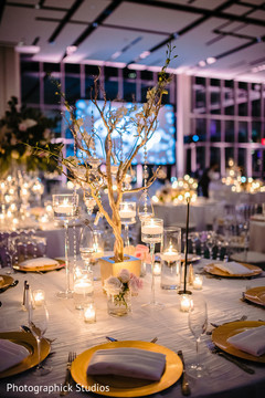Unique Indian wedding reception table centerpiece. Unique Indian wedding reception table centerpiece.