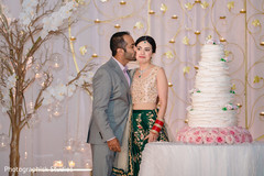 Indian lovebirds at cutting cake moment. Indian lovebirds at cutting cake moment.
