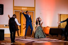 Upbeat Indian couples reception entrance. Upbeat Indian couples reception entrance.
