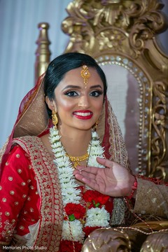 See this Indian bride getting the chain from groom at ceremony. See this Indian bride getting the chain from groom at ceremony.