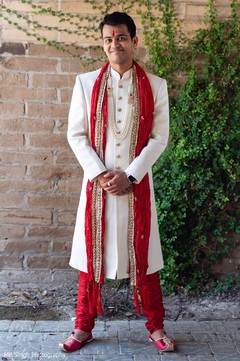 Indian groom posing with sherwani Indian groom posing with sherwani