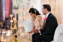 Indian bride and groom during speeches Indian bride and groom during speeches