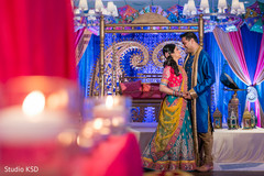 Indian bride and groom having a tender moment Indian bride and groom having a tender moment