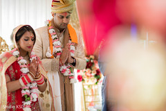 Indian lovebirds at ceremony praying moment. Indian lovebirds at ceremony praying moment.