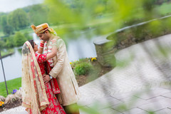 Adorable Indian bride and groom face to face out door portrait. Adorable Indian bride and groom face to face out door portrait.