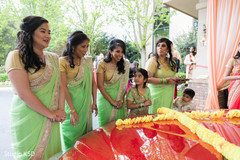 Indian bridesmaids waiting for Indian couple out side ceremony. Indian bridesmaids waiting for Indian couple out side ceremony.
