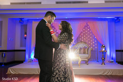 Sweet Indian couple having their first dance. Sweet Indian couple having their first dance.