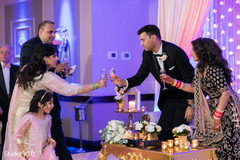 Indian bride and groom at their toast capture. Indian bride and groom at their toast capture.