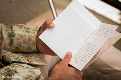 Indian groom reading Maharani's letter Indian groom reading Maharani's letter