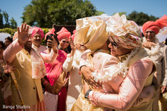 Indian groom with groomsmen hug. Indian groom with groomsmen hug.