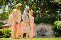 Indian groom walking with groomsmen to ceremony. Indian groom walking with groomsmen to ceremony.