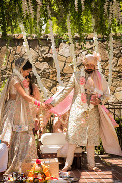 Indian couple walking around the sacred fire. Indian couple walking around the sacred fire.