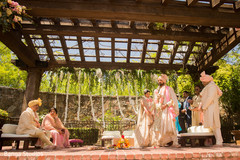 Indian couple walking around sacred fire ritual. Indian couple walking around sacred fire ritual.