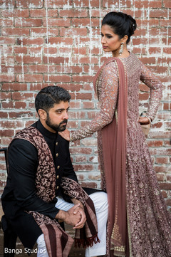 Indian groom on his black and white reception outfit. Indian groom on his black and white reception outfit.