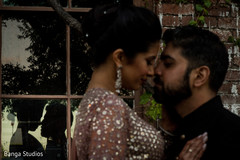 Indian couple's reflection on window glass capture. Indian couple's reflection on window glass capture.