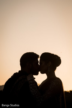Indian couple kiss silhouette photography. Indian couple kiss silhouette photography.