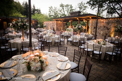 Indian wedding outdoors reception table setup. Indian wedding outdoors reception table setup.