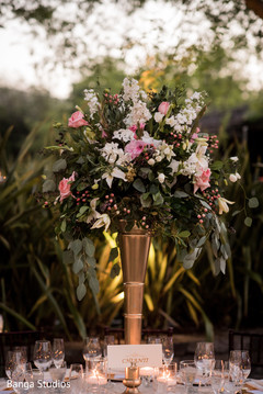 Indian wedding tall golden flower base table centerpiece. Indian wedding tall golden flower base table centerpiece.
