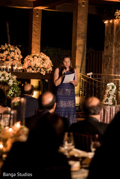 Indian bridesmaid giving out her speech. Indian bridesmaid giving out her speech.