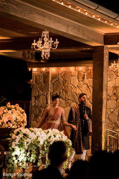 Indian bride and groom reception speech moment. Indian bride and groom reception speech moment.