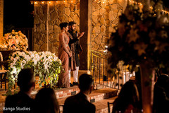 Indian couple giving out a speech at reception party. Indian couple giving out a speech at reception party.