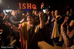 Indian wedding guests rocking the dance floor. Indian wedding guests rocking the dance floor.