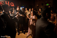 Upbeat indian wedding reception dance photo. Upbeat indian wedding reception dance photo.