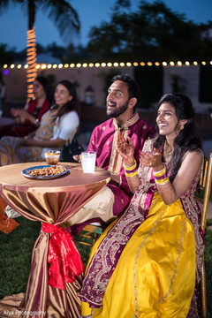 Indian bride and groom at their sangeet party. Indian bride and groom at their sangeet party.