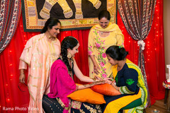 Mehndi artist at work Mehndi artist at work