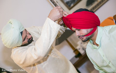 Indian groom putting his turban on Indian groom putting his turban on