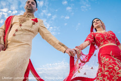 Indian couple holding hands outdoors Indian couple holding hands outdoors