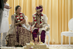 Joyful Indian couple at wedding ritual capture. Joyful Indian couple at wedding ritual capture.