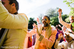 Indian groom having fun during baraat Indian groom having fun during baraat