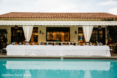 Table by the pool at the reception Table by the pool at the reception