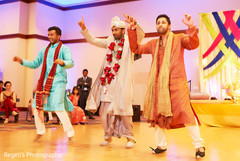 Indian groom dancing during sangeet Indian groom dancing during sangeet