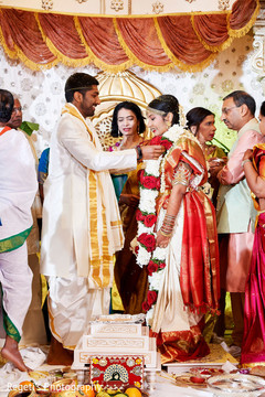 Indian couple at the Varmala ritual. Indian couple at the Varmala ritual.