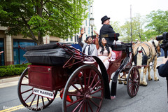 Indian couple arriving to their wedding reception on a carriage. Indian couple arriving to their wedding reception on a carriage.