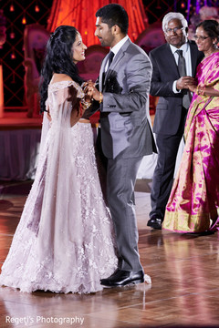 Sweet Indian couple having their first dance. Sweet Indian couple having their first dance.