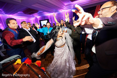 Cheerful Indian bride at wedding reception dance. Cheerful Indian bride at wedding reception dance.