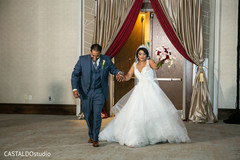Indian bride and groom entrance to reception capture. Indian bride and groom entrance to reception capture.