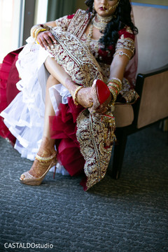Maharani putting her ceremony shoes on capture. Maharani putting her ceremony shoes on capture.