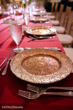 Elegant Indian wedding reception table setup. Elegant Indian wedding reception table setup.