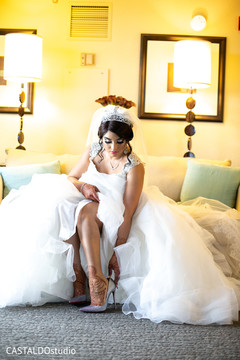 Maharani putting her shoes on. Maharani putting her shoes on.