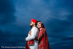 Indian bride and groom posing for pictures Indian bride and groom posing for pictures