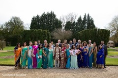 Lovely Indian couple posing with bridesmaids and groomsmen. Lovely Indian couple posing with bridesmaids and groomsmen.
