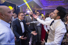 Indian relatives celebrating at reception party. Indian relatives celebrating at reception party.