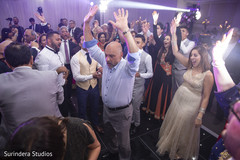 Upbeat indian wedding reception dance capture. Upbeat indian wedding reception dance capture.