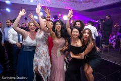 Joyful Indian bride with bridesmaids photo. Joyful Indian bride with bridesmaids photo.